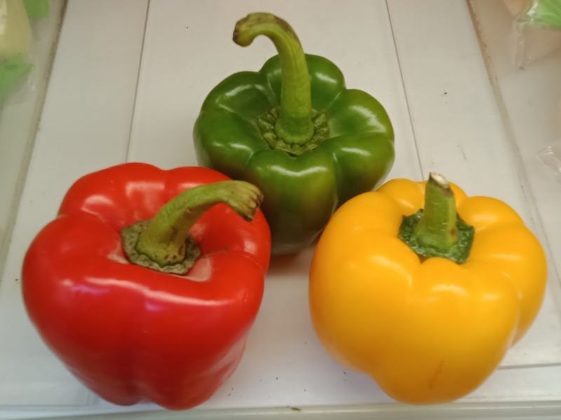 Red, yellow, and green bell peppers